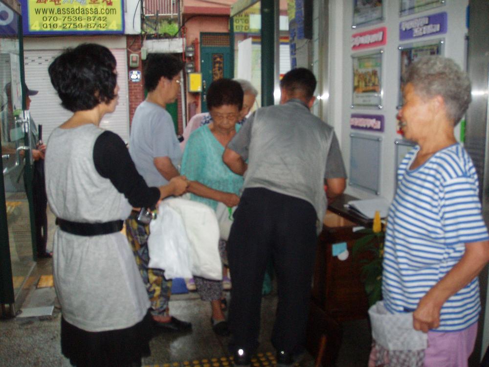 사랑의 뒤주쌀 나누기(7.23) 사진