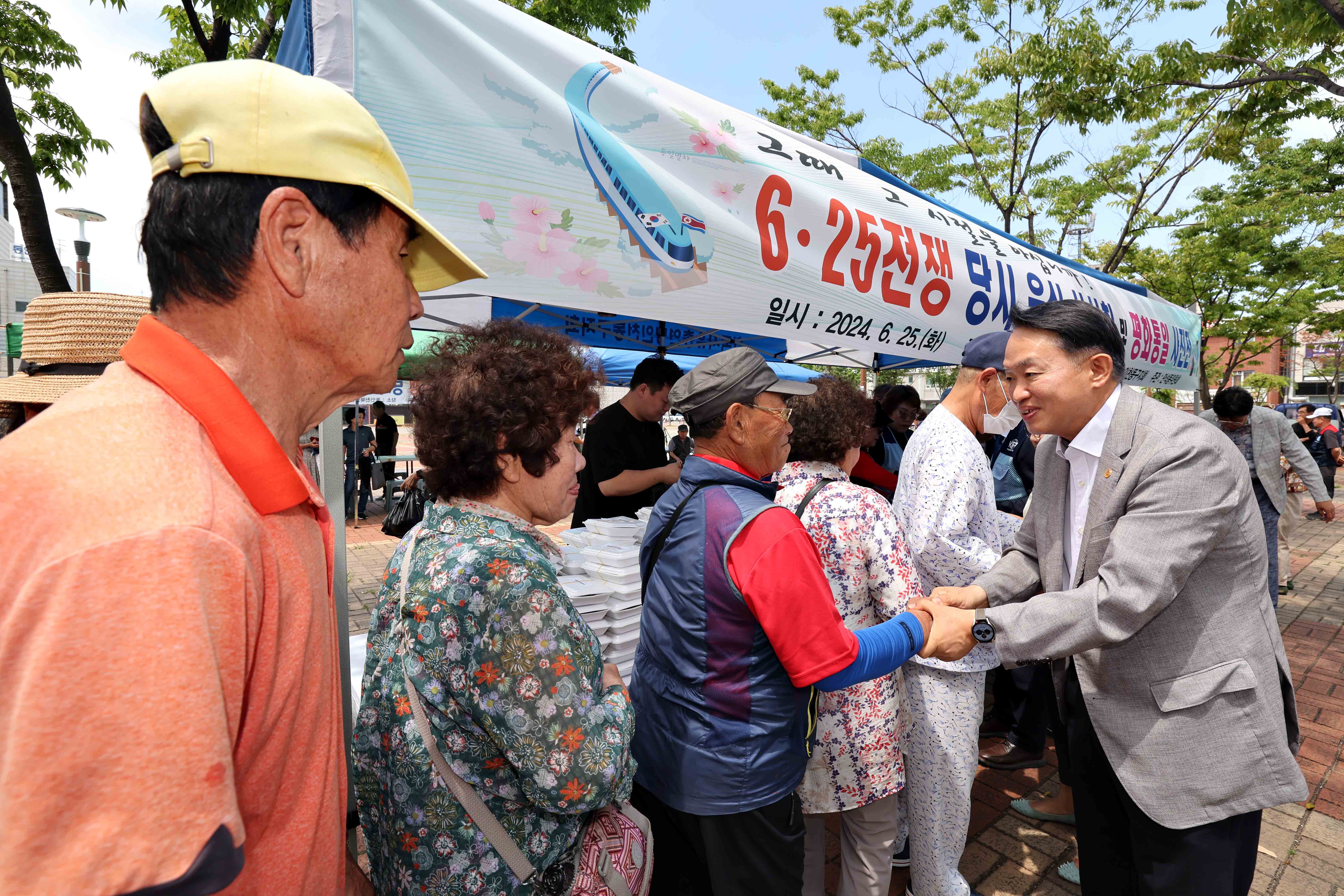 20240625_한국자유총연맹_625전쟁_음식_시식회_및_평화통일_사진전7.jpg 이미지